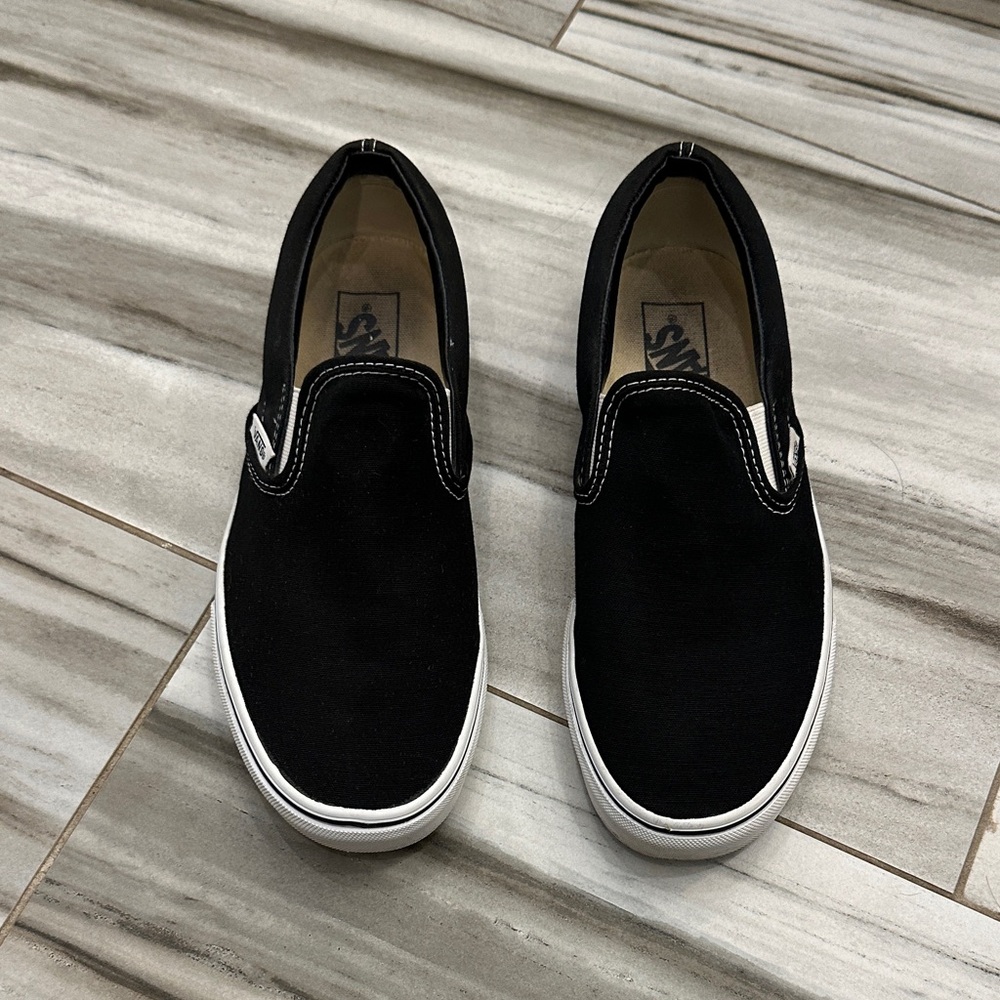 Vans unisex Black and White Slip-On Sneakers